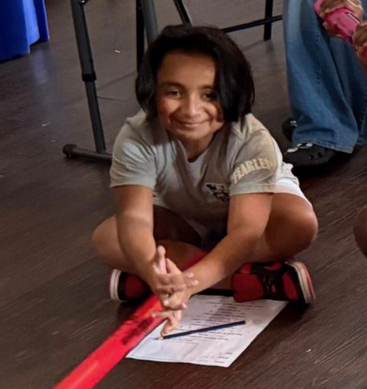 student gazing at boombot